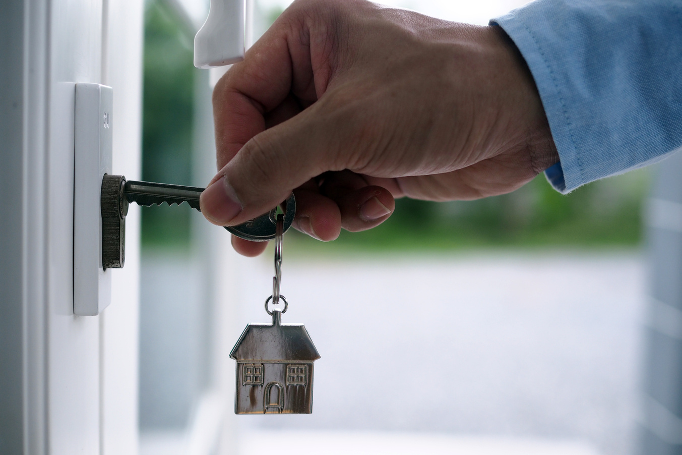 Homeowner Putting Keys into Keyhole
